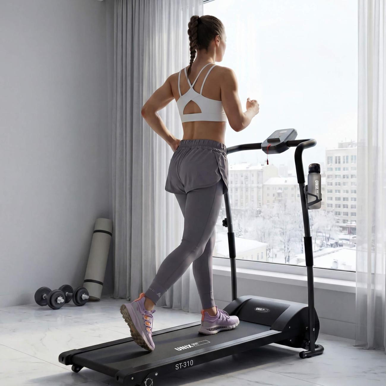 Беговая дорожка для дома UnixFit ST-310 складная, пиковая мощность 1,5 л. с, до 100 кг, беговое полотно 100x30 см, скорость 1 - 9 км/ч, угол наклона 0-10%