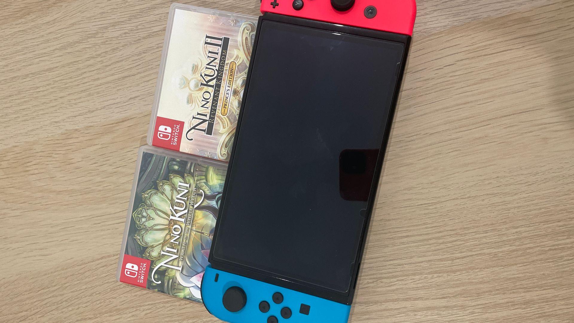 Игровая консоль Nintendo Switch OLED (неоновый синий/неоновый красный) - отзывы покупателей и владельцев | М.Видео - Москва